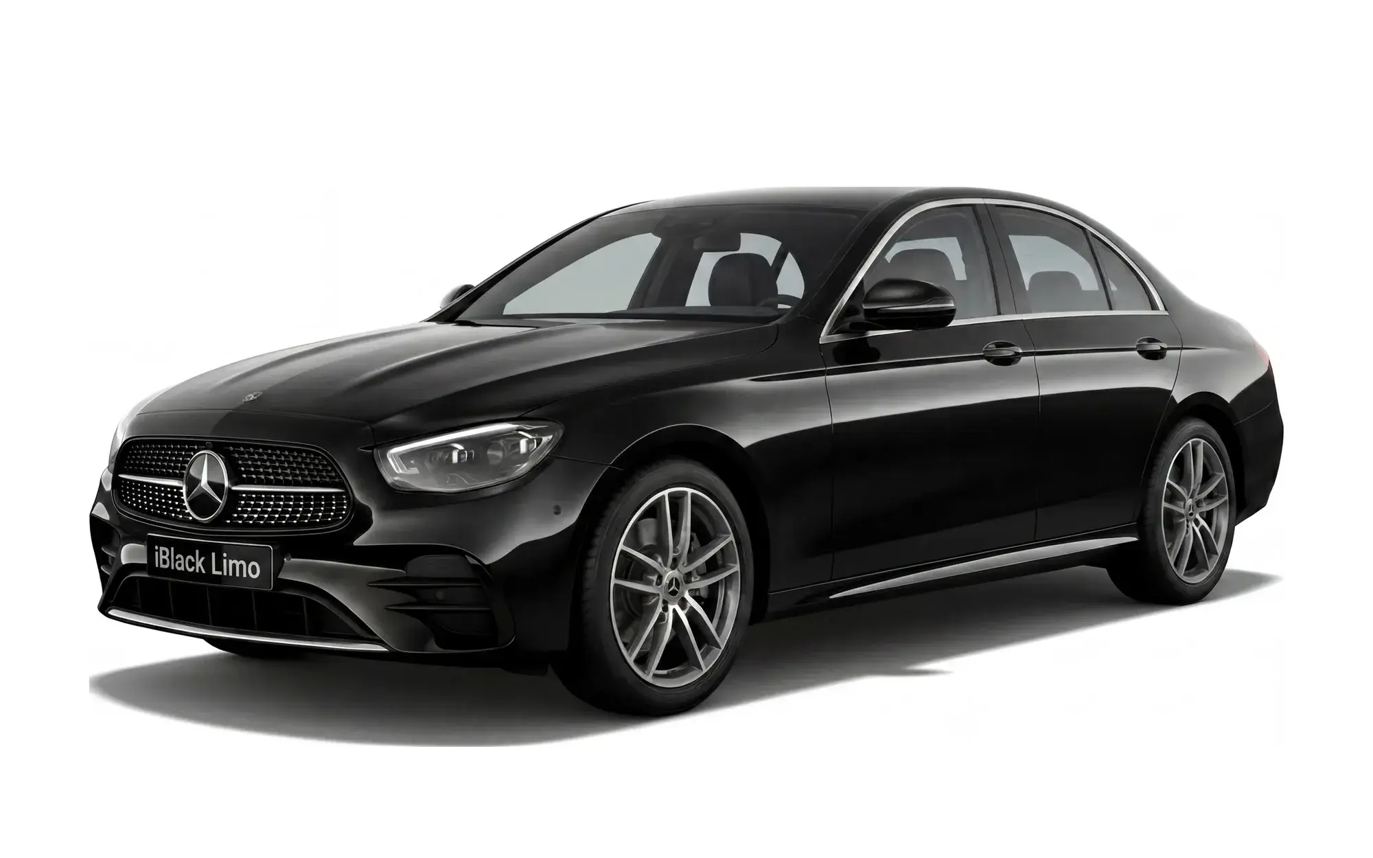 Black Mercedes-Benz E-Class luxury sedan, front three-quarter studio view on white